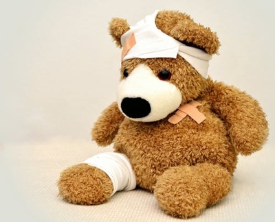 A bear wearing bandages.