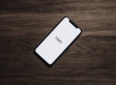 A phone screen that reads, "Hello"