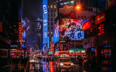 A neon lit broadway