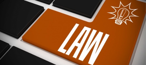 Graphic of the word 'Law' and a lightbulb icon atop a brown background